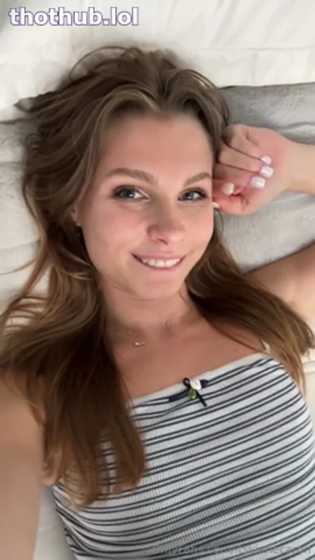 Kelly Jane Caron-Gerstine is cozying up in bed 1