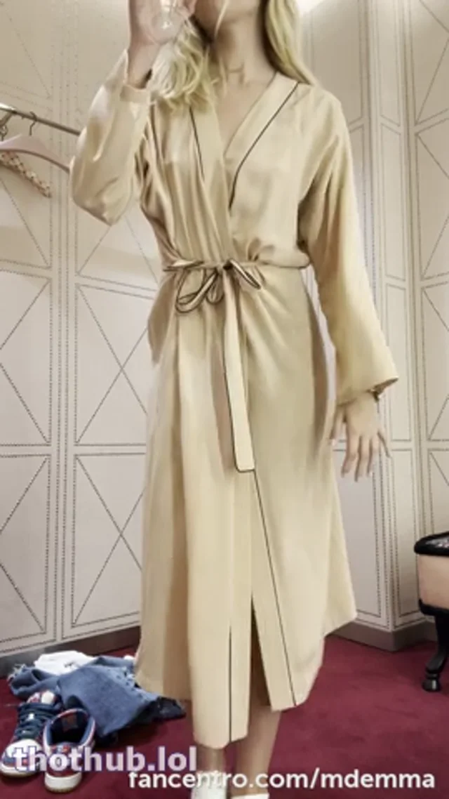 Mdemma throws off her beige robe and teases