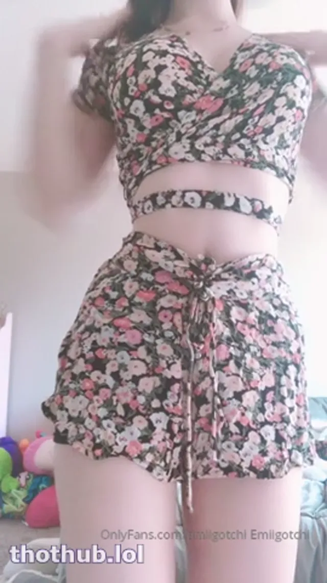 Emi posing in a summer outfit