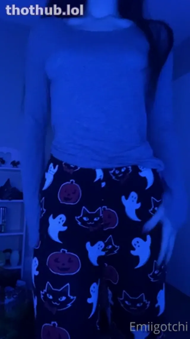 Emi in Halloween pants shows her boobs
