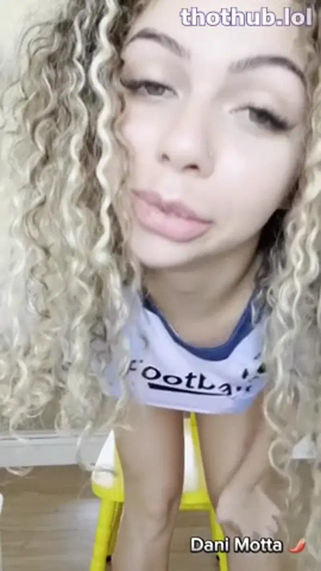 Dani motta bounces on her big toy