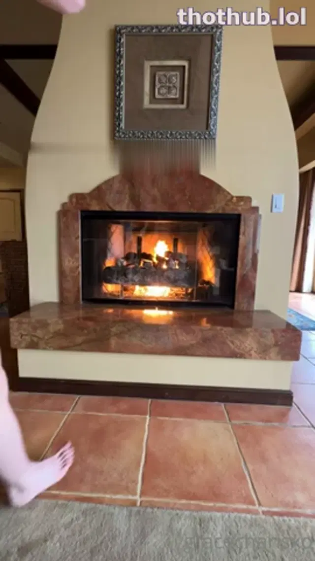 Grace Charis nude fireplace striptease
