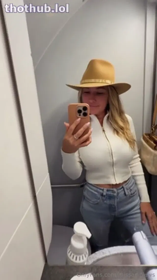 Amy Leigh Andrews flashes tits in bathrooms