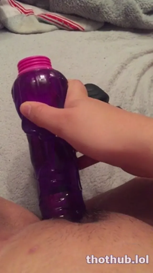 Hugekcups fucking her pussy with a purple dildo