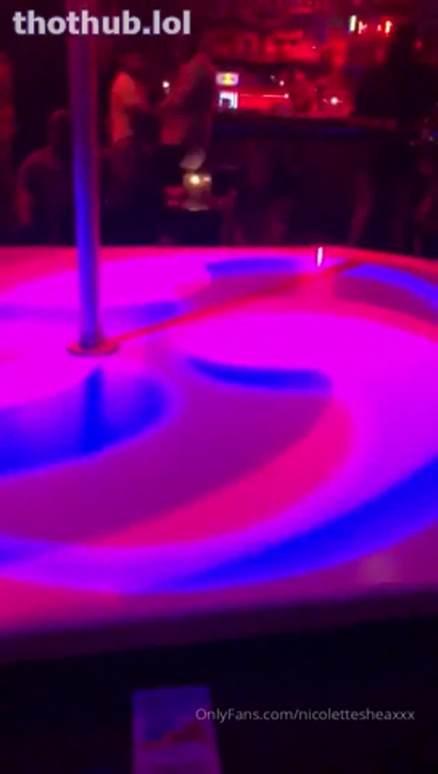 Nicolette Shea pole dancing in a go-go club