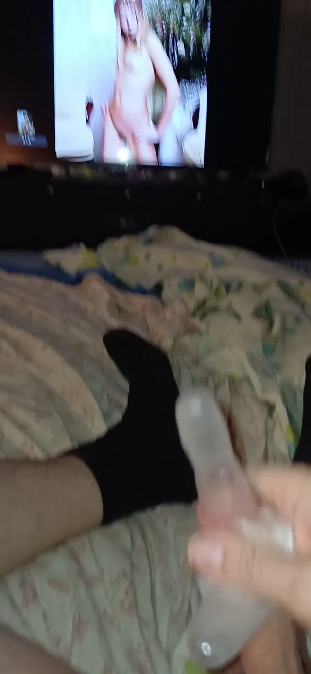 Masturbating