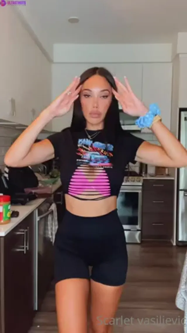 Scarlet Silva Stripteasing with Ass Slapping