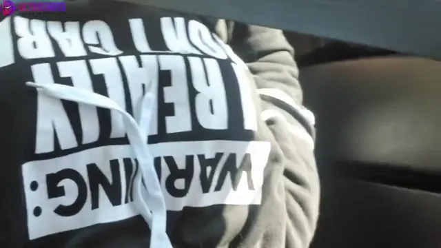 Masturbating in the Car While Her Husband Drives