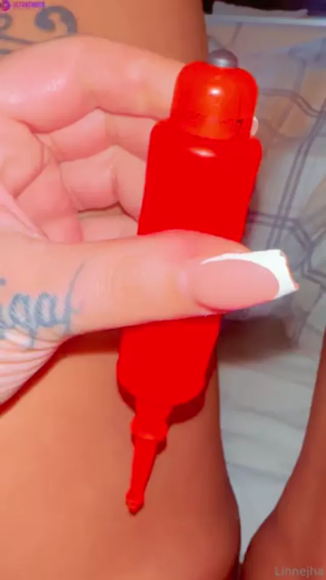 Swedish Linnejha plays with her favorite toy