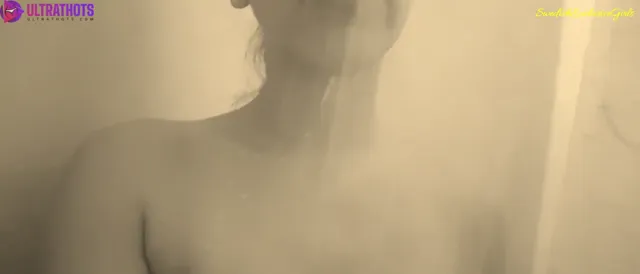 Swedish Babe Candy showers her naked sexy body