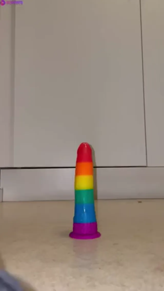 Swedish Nell Kronberg riding rainbow dildo
