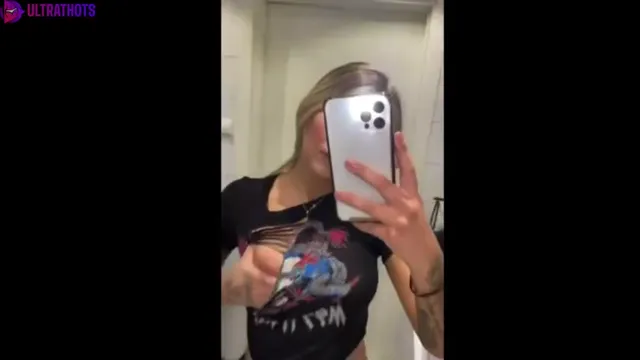 Josefin Ottosson showing 1 of her breast