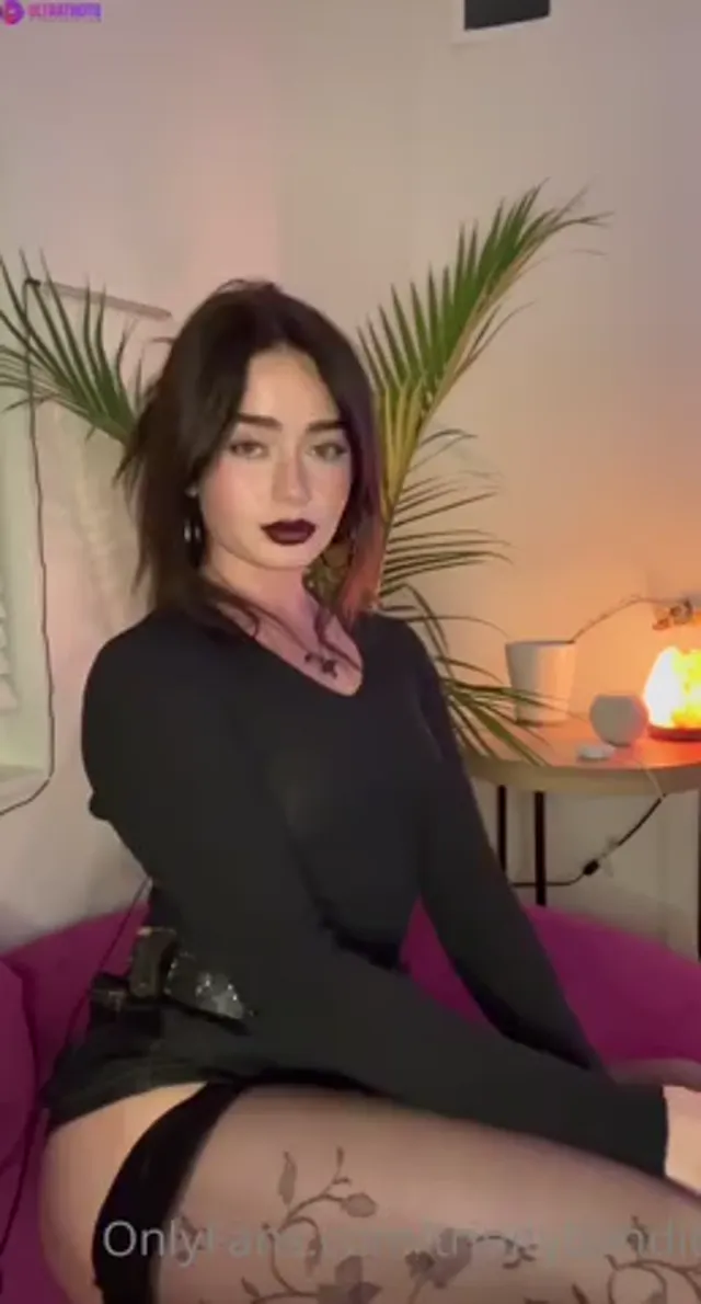 Trinity Bandit Shakes Booty On The Couch In Sexy Dress