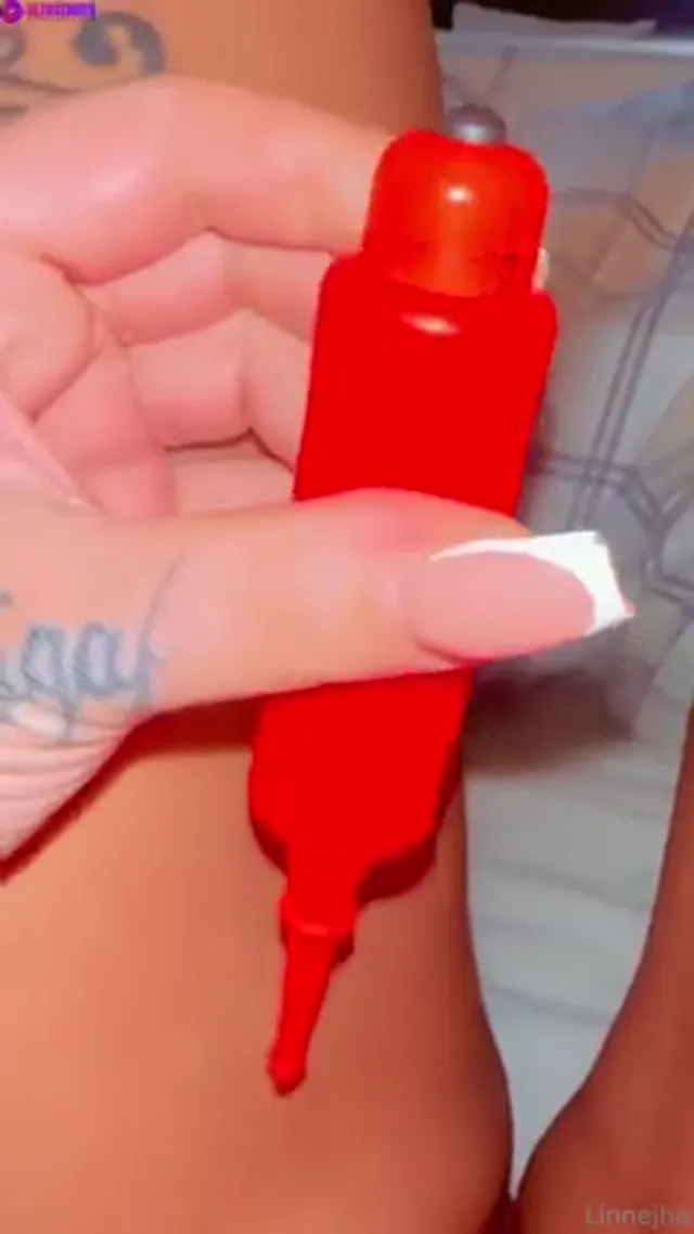 Linnejha plays with small vibrator