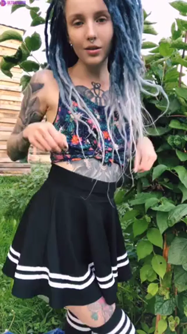 Tattooed German Babe Stripteasing Naked in Public