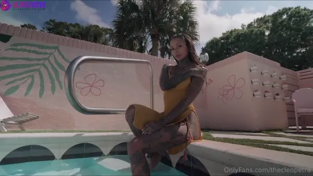 Swedish Cleo Topless Tease In Pool